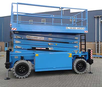 a 19m Hollandlift diesel scissor lift with stabilisers for use on rough terrain